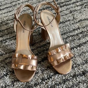 INDIGO RD.  Rose Gold block he’ll dress shoes with ruffle strap over toes.